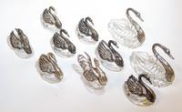 Nine Silver Mounted Glass Swan Form Salts Height of tallest 4 1/4 inches.