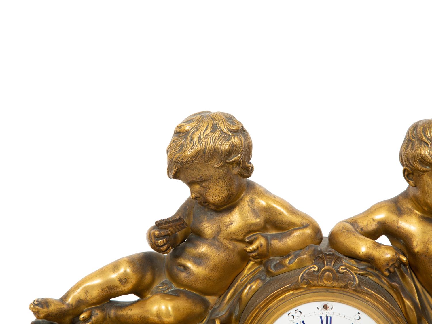 A Louis XV Style Gilt Bronze and Marble Mantel Clock