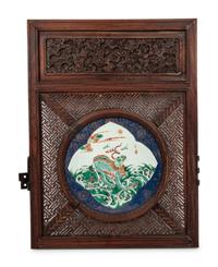 A Famille Verte Porcelain Plaque Inset Wood Wall Panel