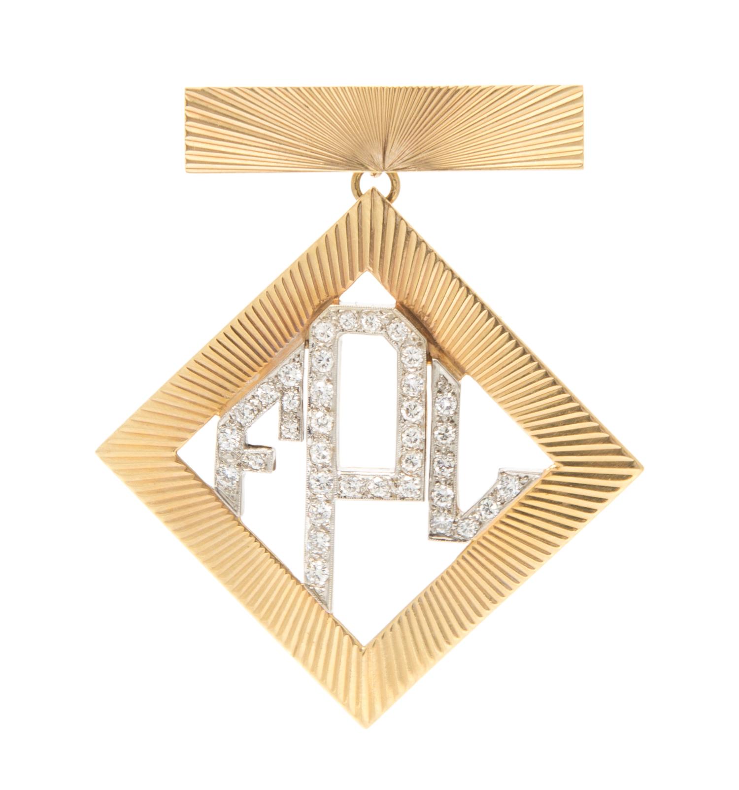A 14 Karat Yellow Gold and Diamond Lapel Brooch, 11.00 dwts.