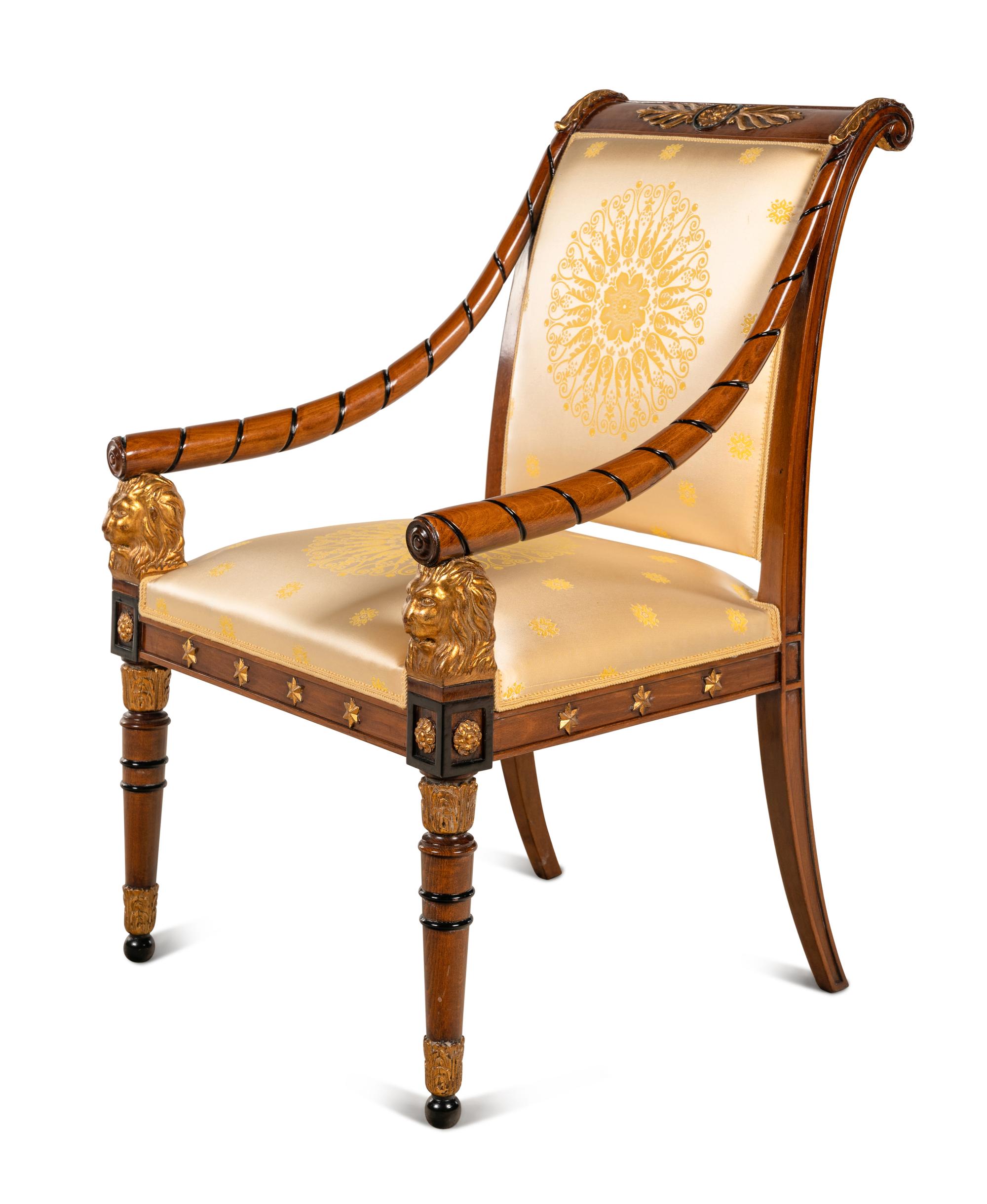 An Empire Style Parcel Gilt and Ebonized Armchair