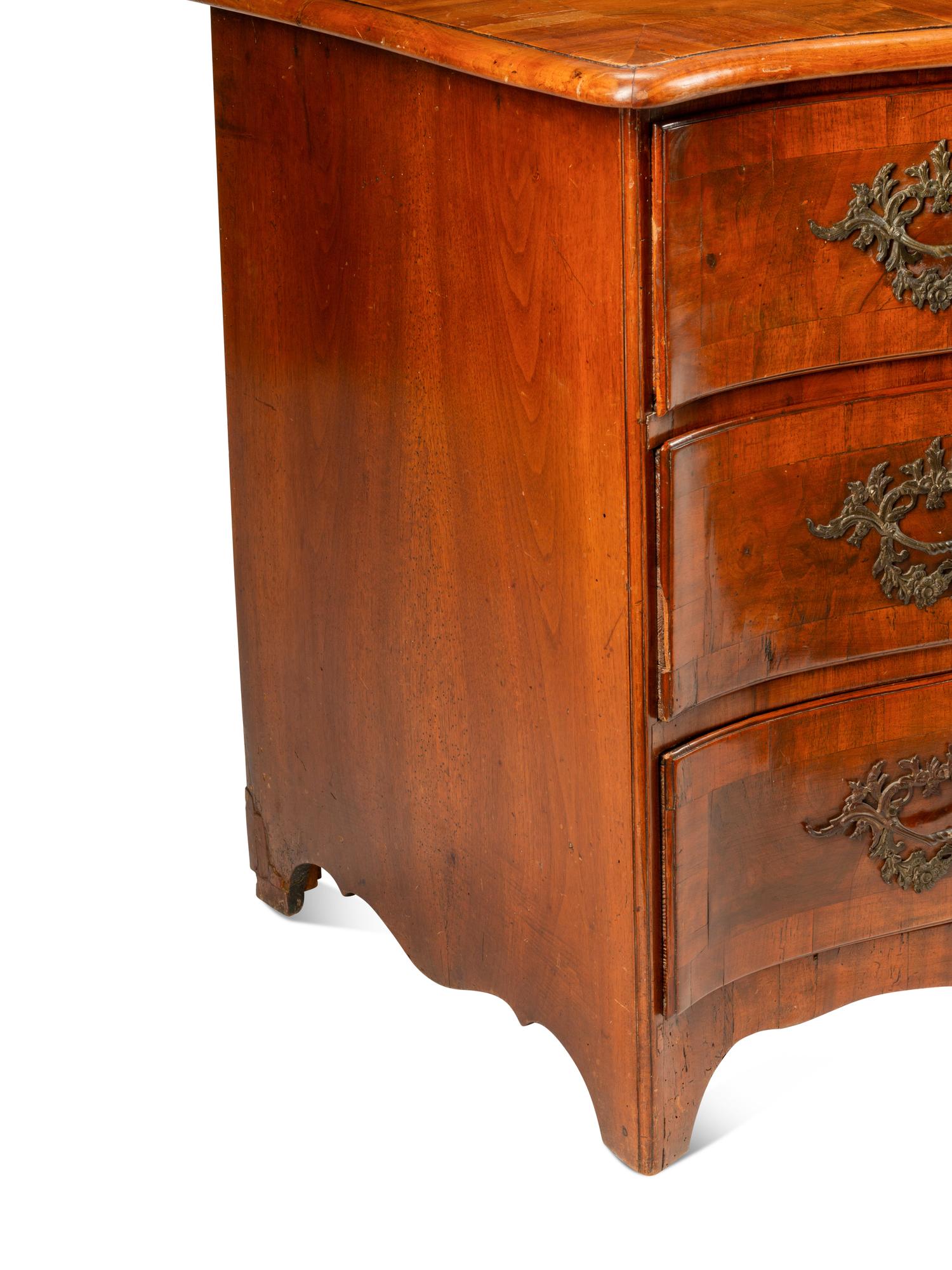 A Continental Walnut Commode