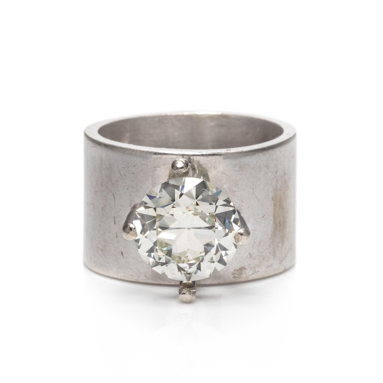 A White Gold and Diamond Ring,