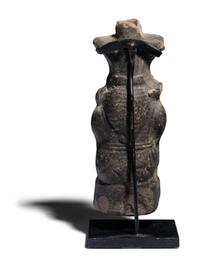 An Egyptian Terracotta Vessel in the form of Bes