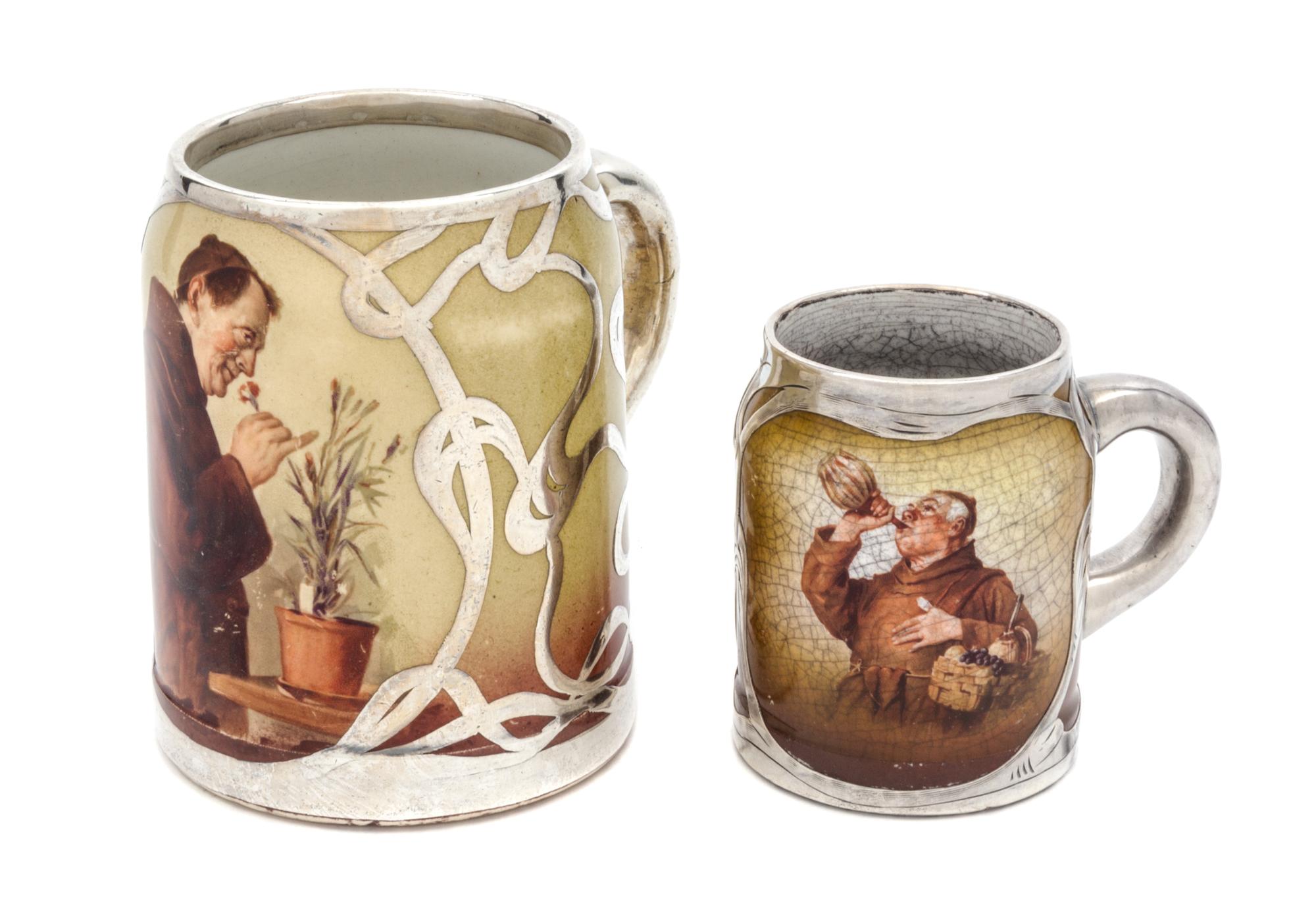Two Ceramic Silver Overlay Mugs Height of taller 4 1/4 inches.