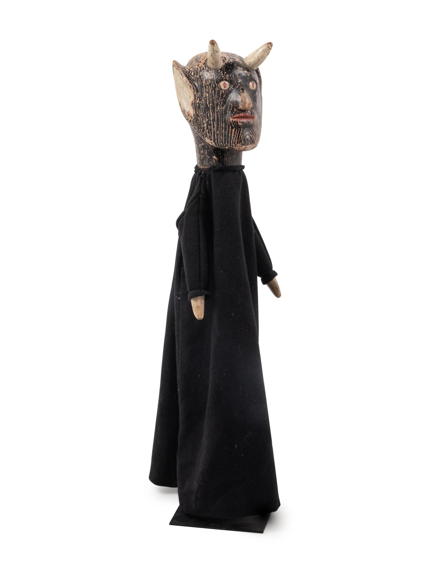 A Carved Wood Puppet
