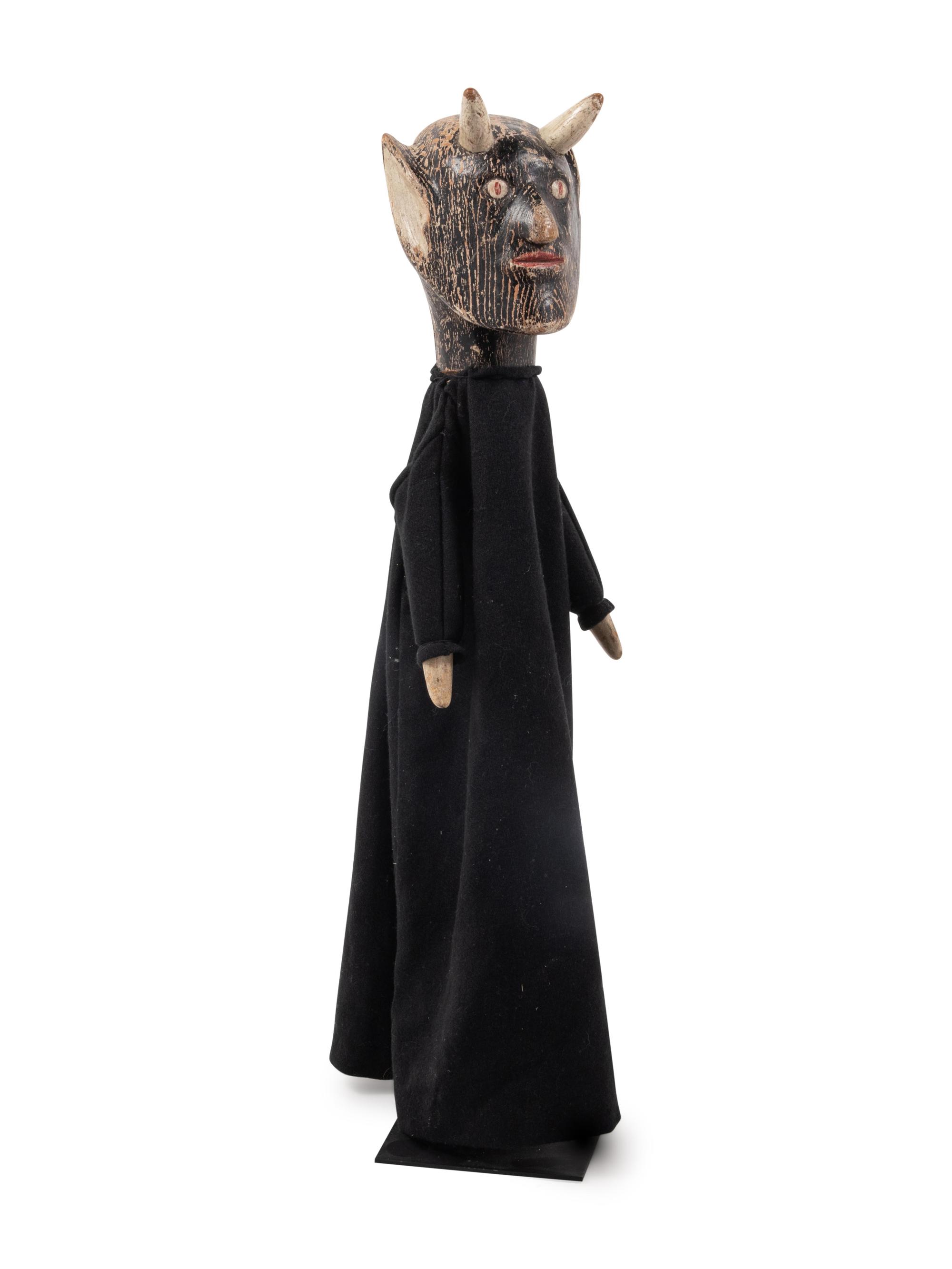 A Carved Wood Puppet