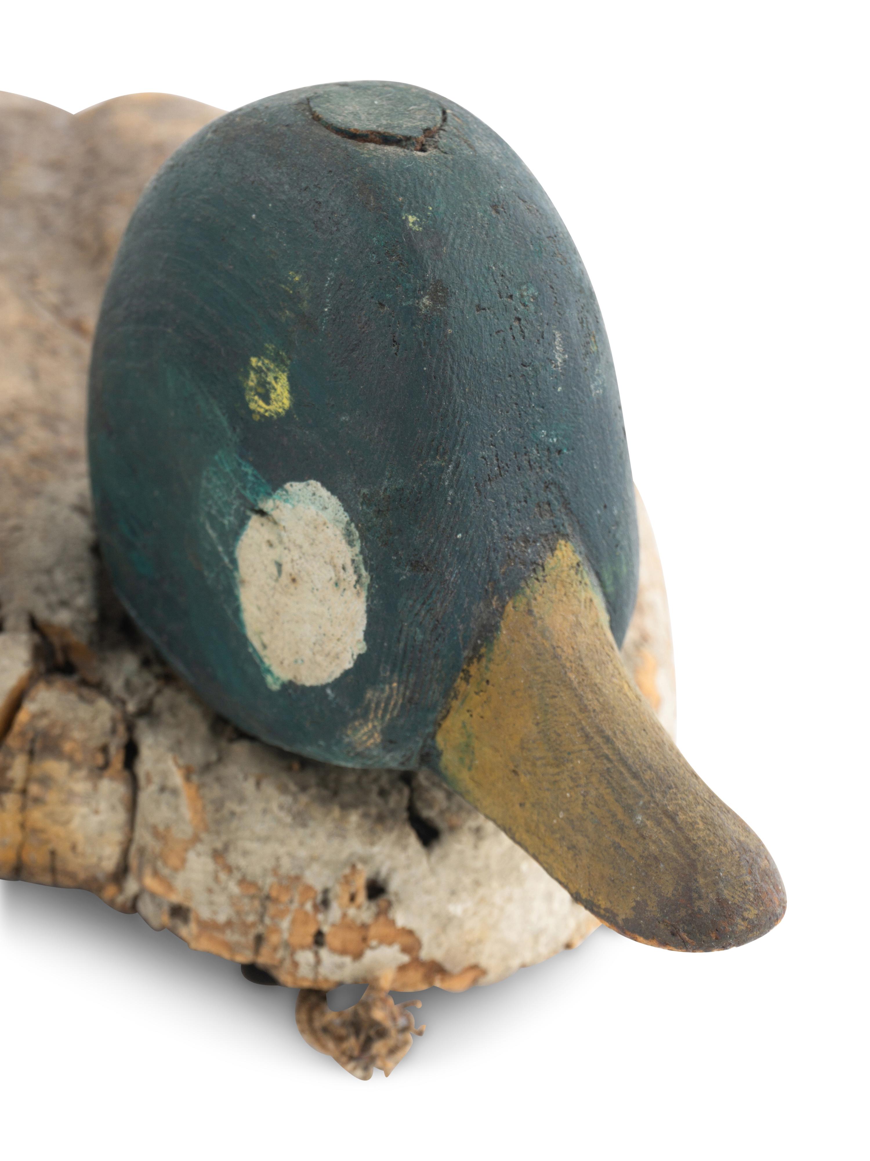 A Group of Three Wood Decoys