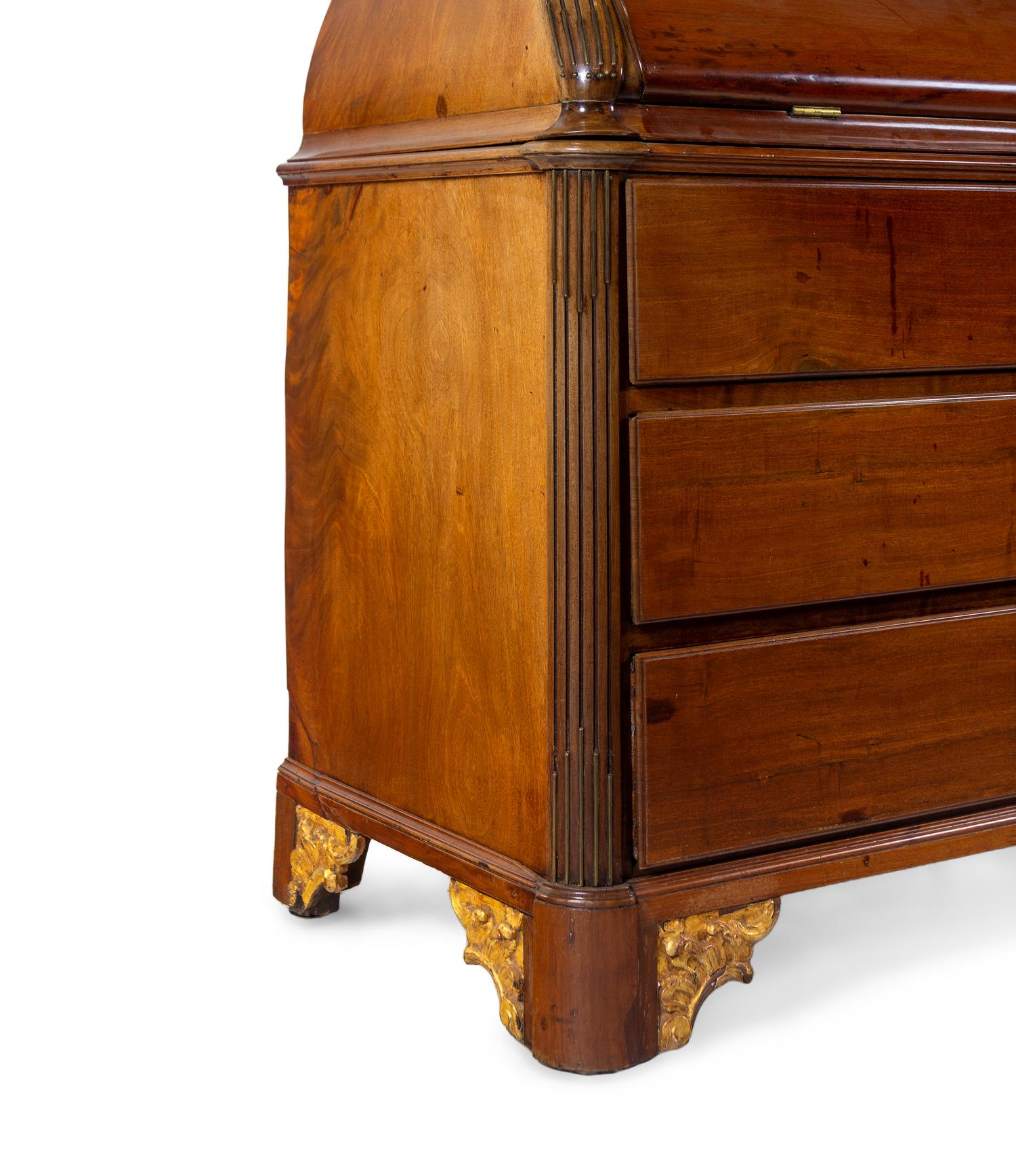 A Baltic Neoclassical Parcel Gilt Walnut Secretary