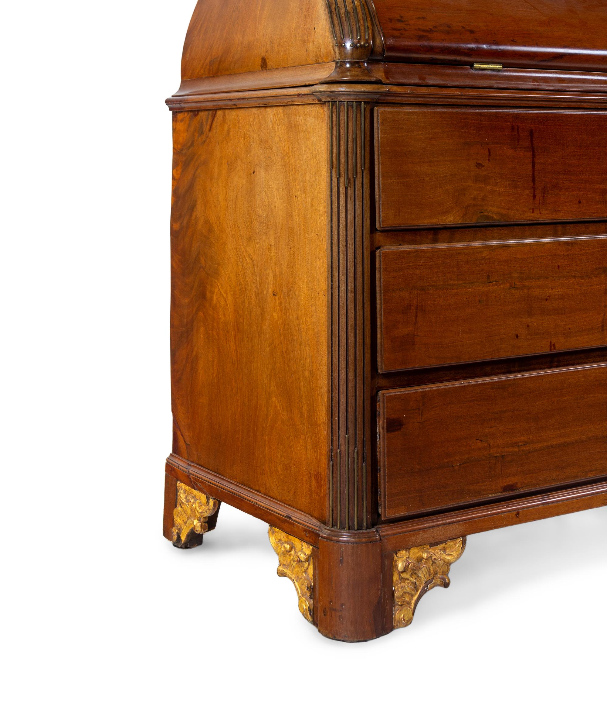 A Baltic Neoclassical Parcel Gilt Walnut Secretary
