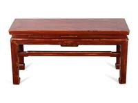 An Asian Red Painted Low Table — 20TH CENTURY