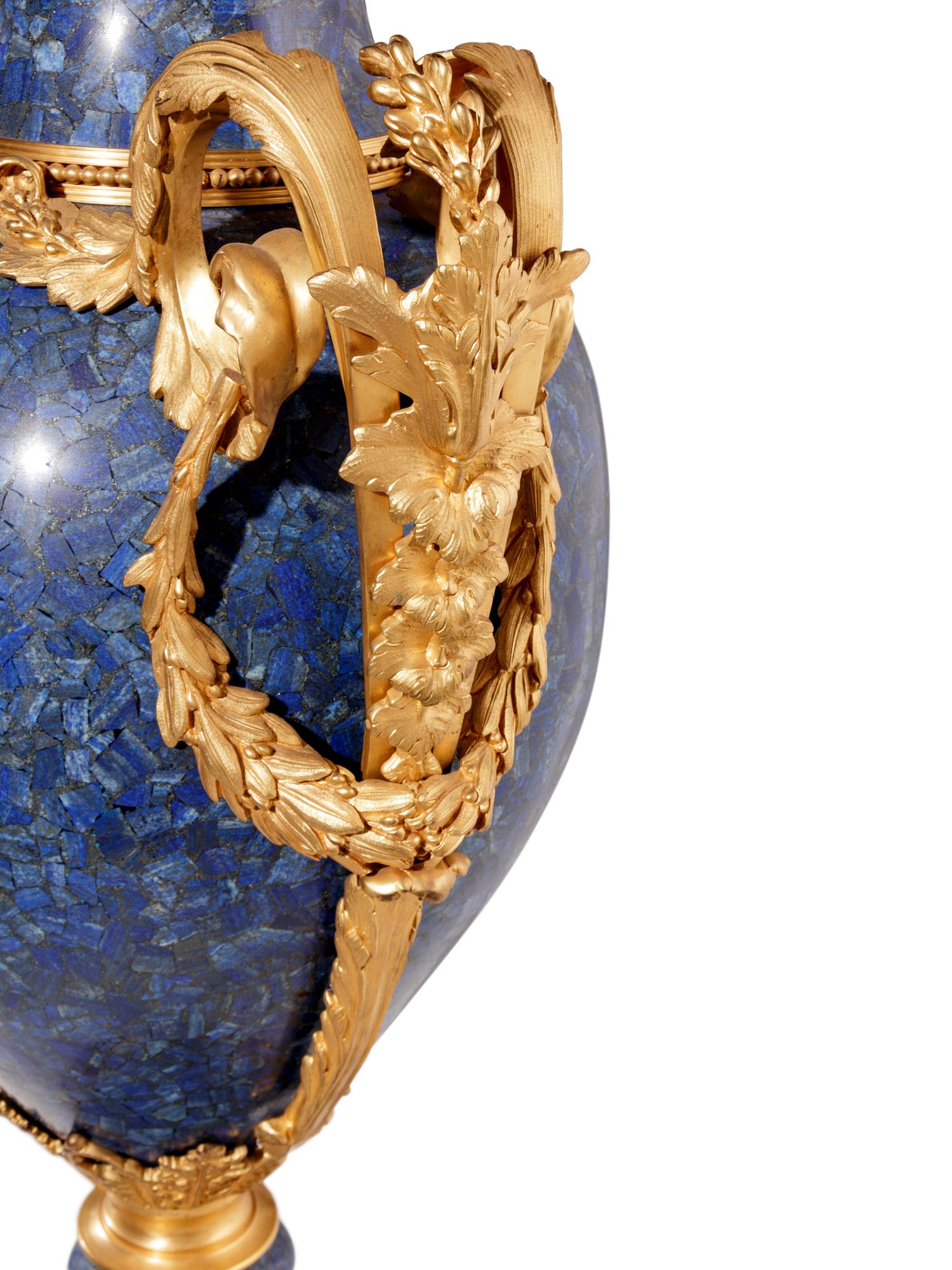 A Pair of Monumental Louis XV Style Gilt Bronze Mounted Lapis Lazuli Veneered Urns