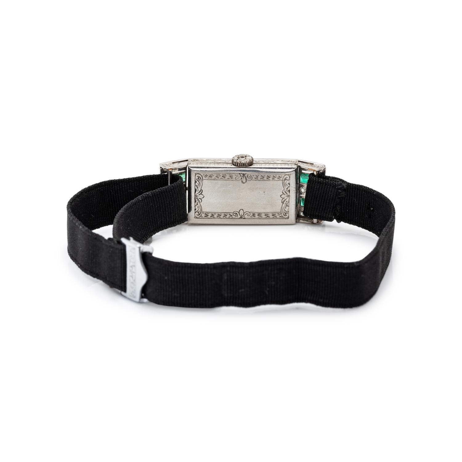 AGASSIZ, ART DECO, PLATINUM, DIAMOND AND EMERALD WATCH