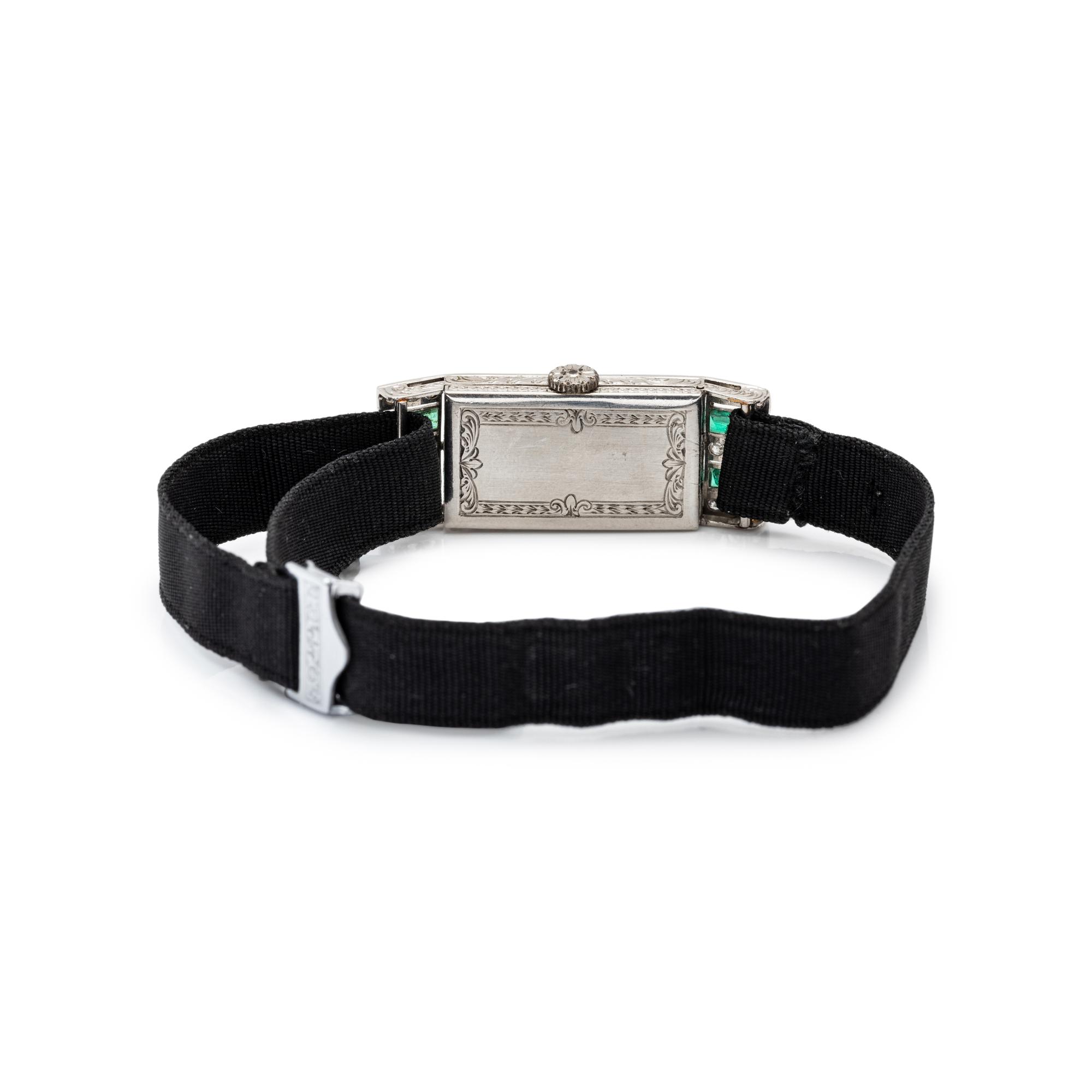 AGASSIZ, ART DECO, PLATINUM, DIAMOND AND EMERALD WATCH