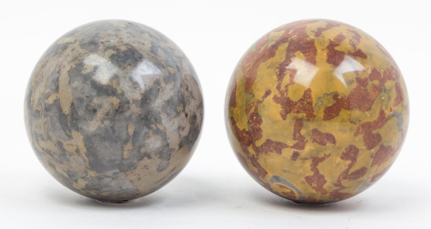A Pair of Small Marble Orbs. Diameter 4 inches.