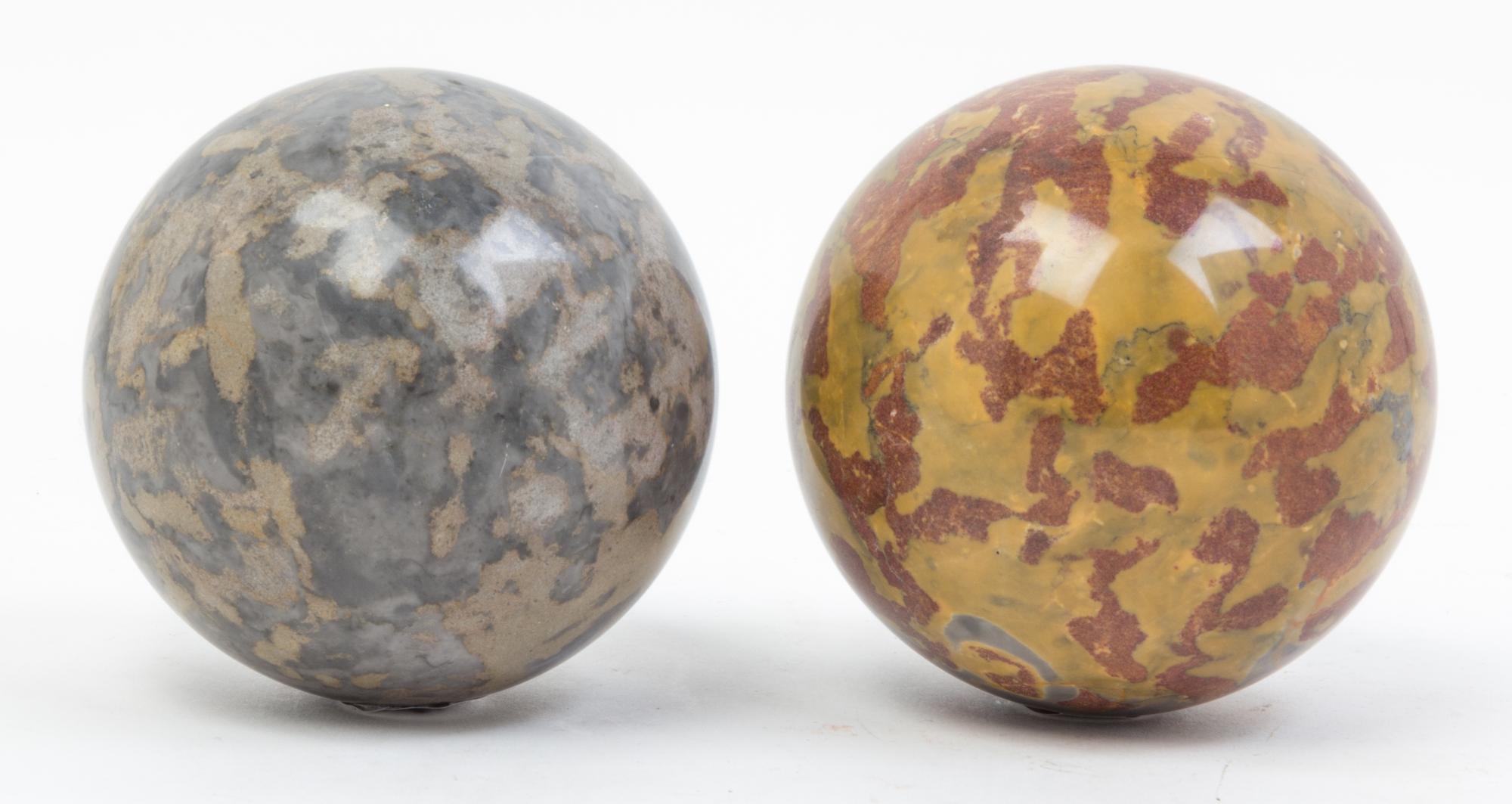 A Pair of Small Marble Orbs. Diameter 4 inches.
