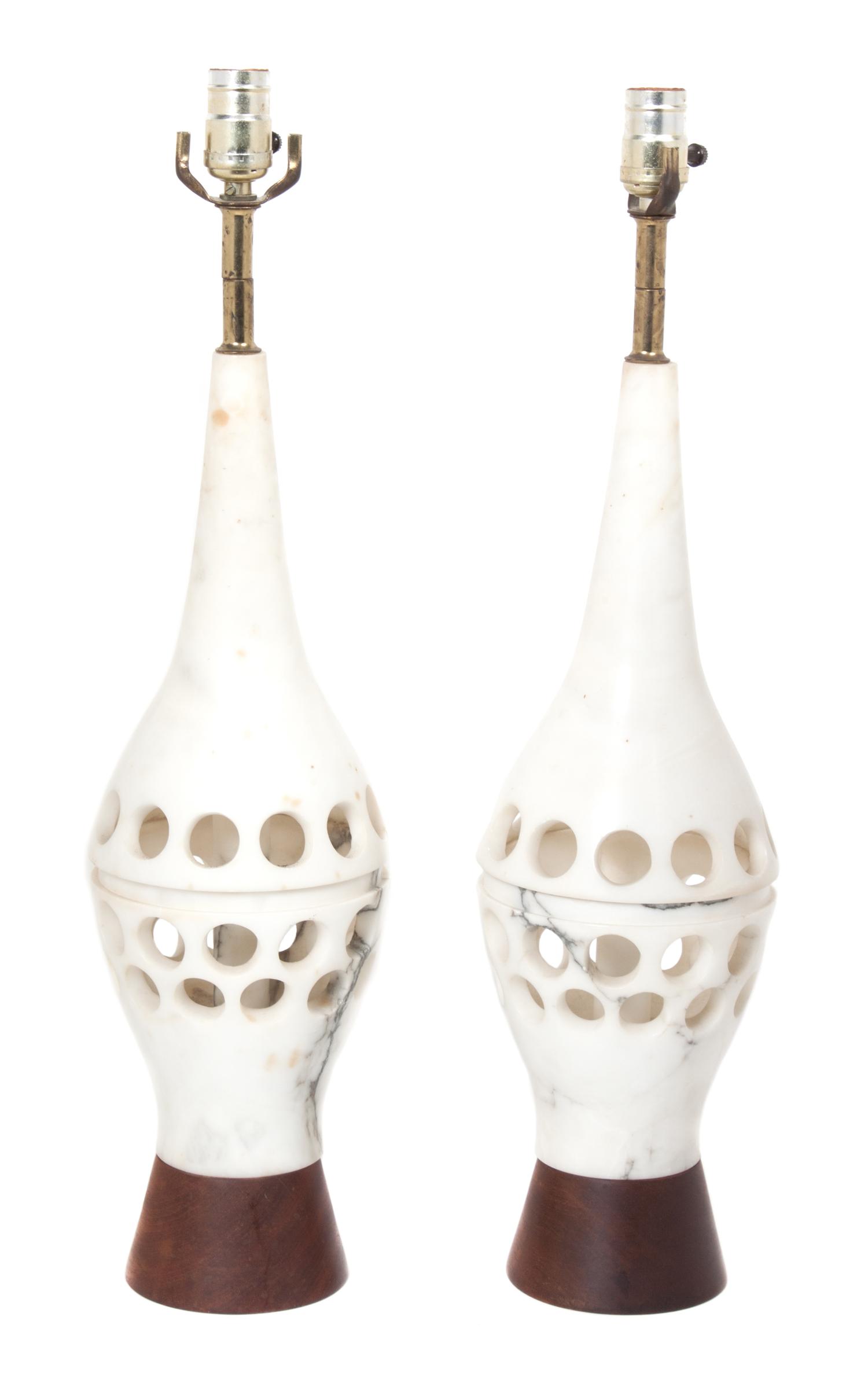 A Pair of Pierced Marble Lamps Height of each 25 1/4 inches.