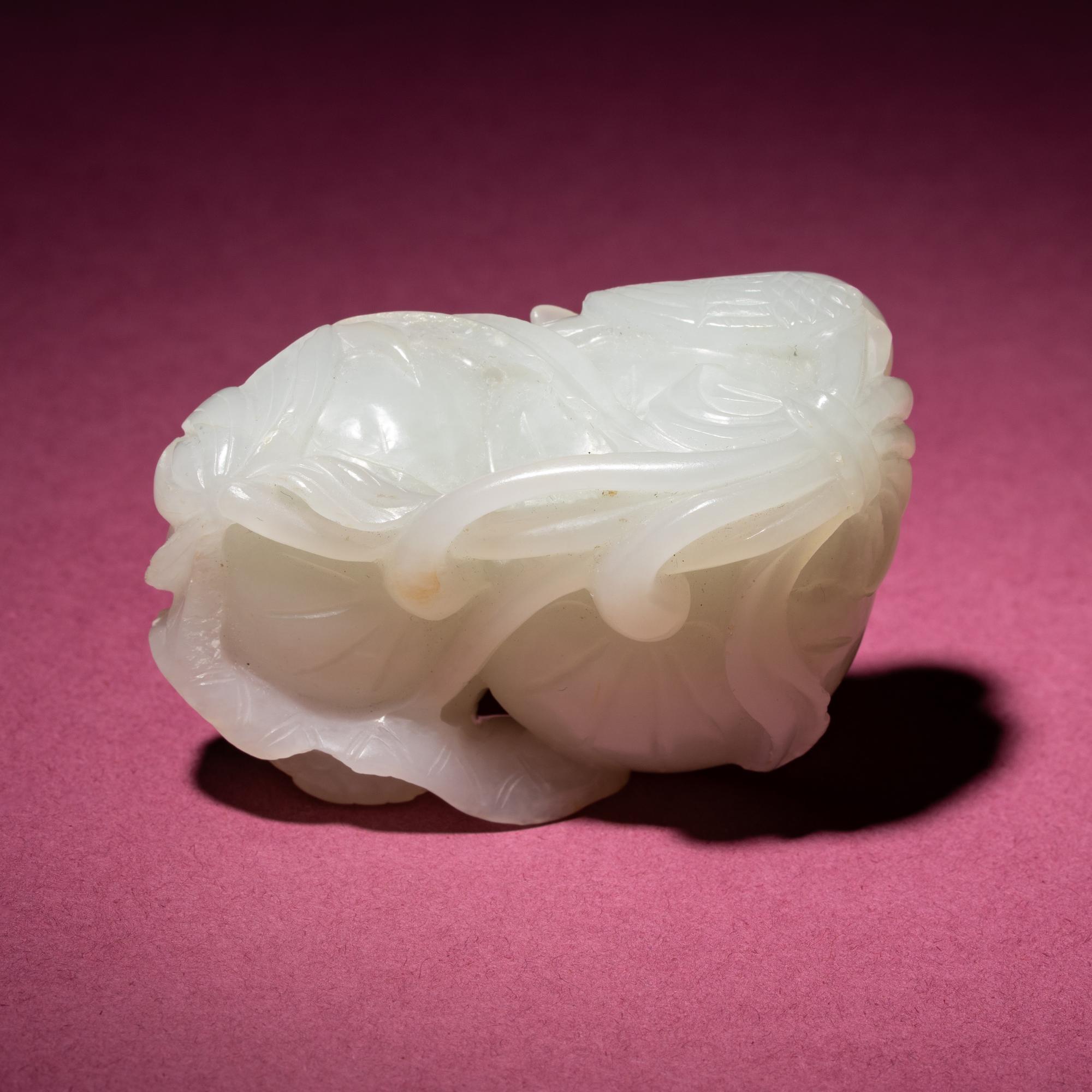 A Chinese White Jade Carving of Double Lotus Pods, 18th/19th Century — 清中期 白玉雙蓮子把件