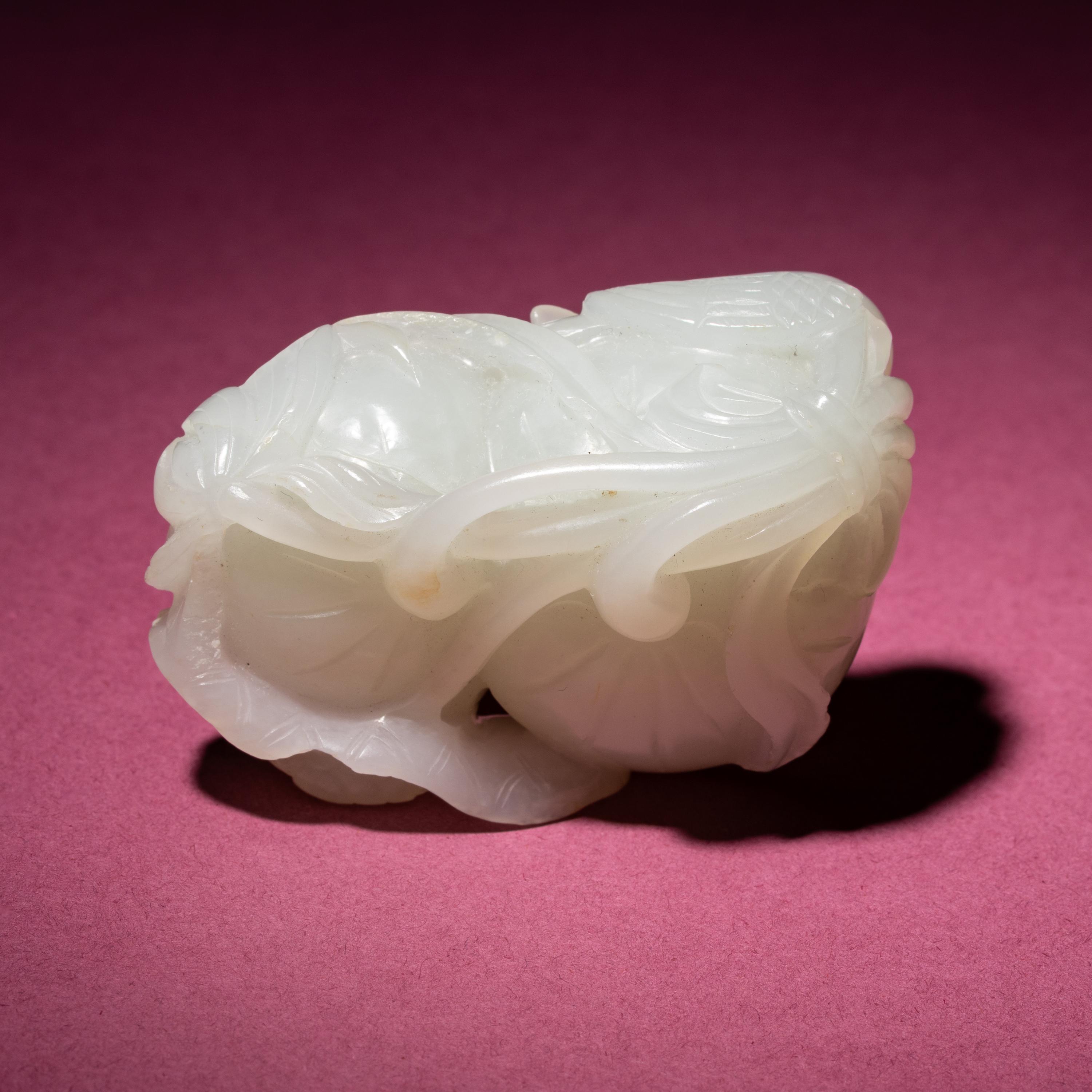 A Chinese White Jade Carving of Double Lotus Pods, 18th/19th Century — 清中期 白玉雙蓮子把件