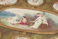 A Napoleon III Gilt Bronze Mounted Onyx and Porcelain Plaque-Inset Table