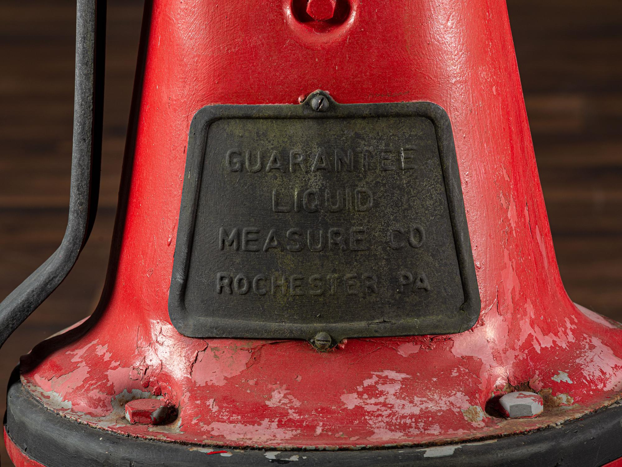 An American Painted Metal Gravity Gas Pump, Guarantee Liquid Measure