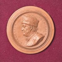 Jean-Baptiste Nini (Italian, 1717-1786) A Terracotta Portrait Medallion of Benjamin Franklin (1706-1790), France, dated "1777"