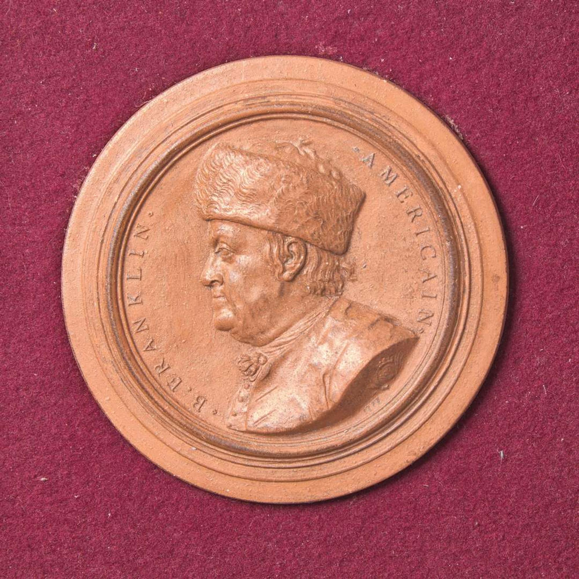 Jean-Baptiste Nini (Italian, 1717-1786) A Terracotta Portrait Medallion of Benjamin Franklin (1706-1790), France, dated "1777"