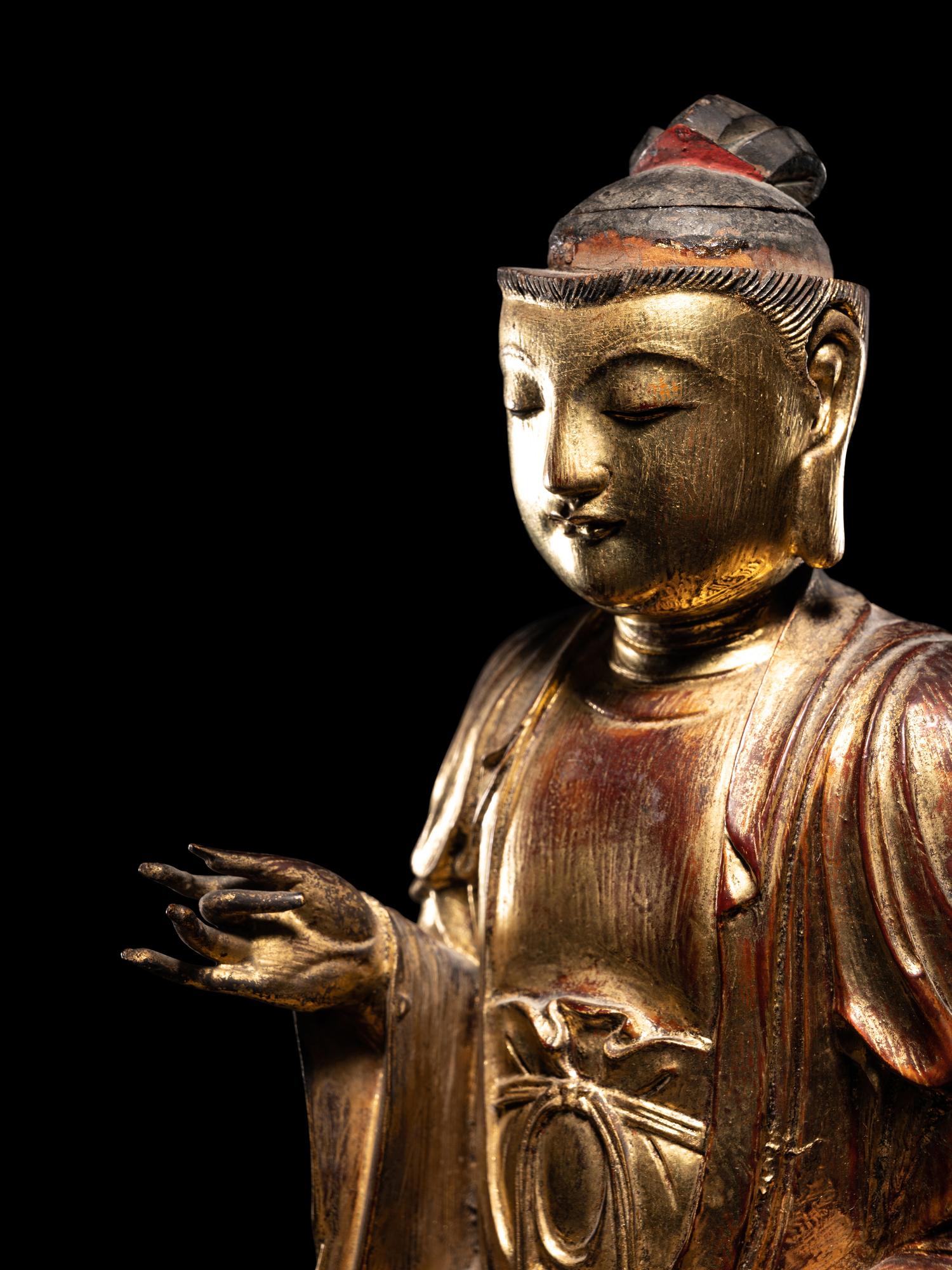 A Chinese Gilt Wood Figure of Seated Buddha Shakyamuni