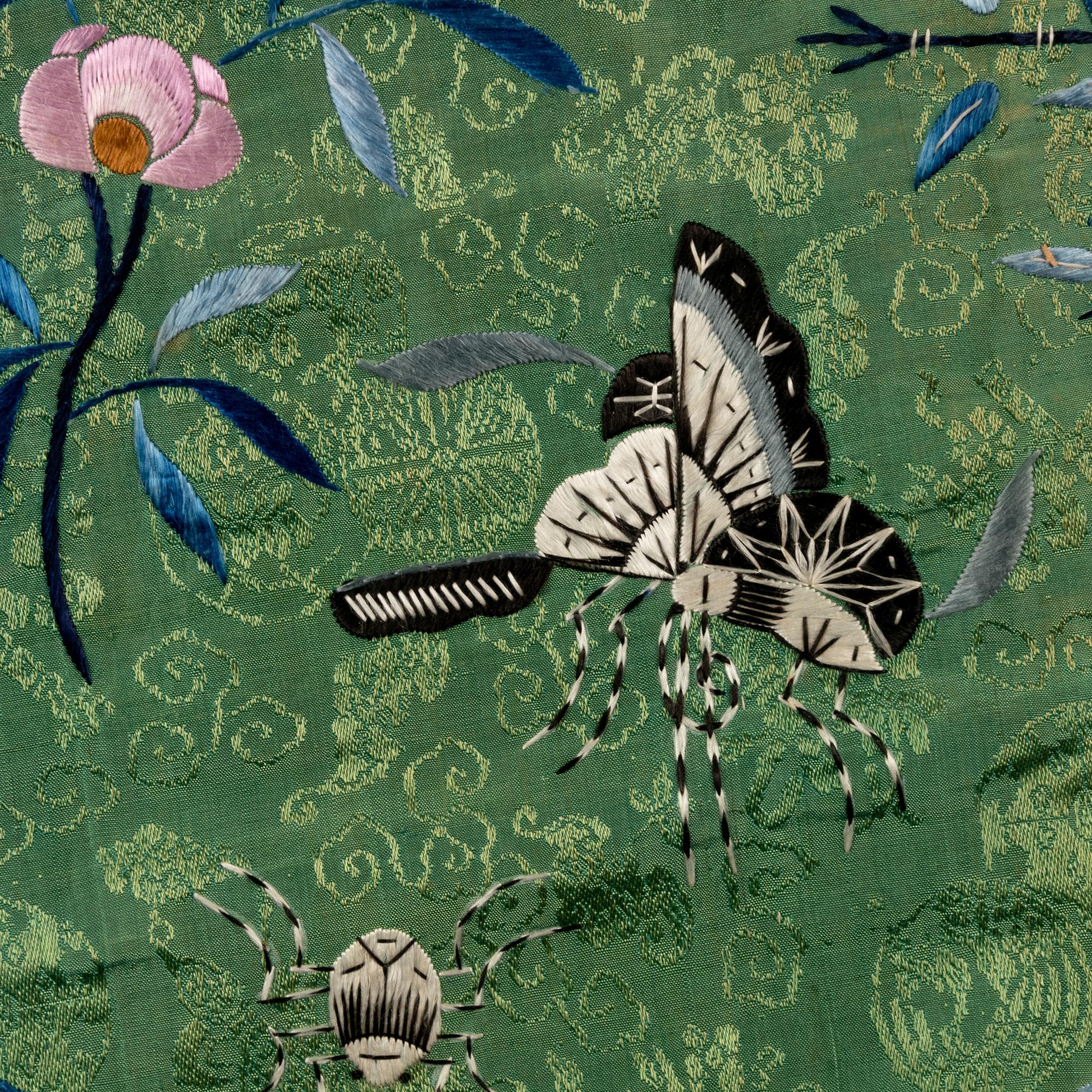 A Chinese Apple Green Ground Embroidered 'Peonies and Insects' Silk Lady's Robe, Changyi, 19th Century 清晚期 蘋果綠地綉牡丹草蟲氅衣