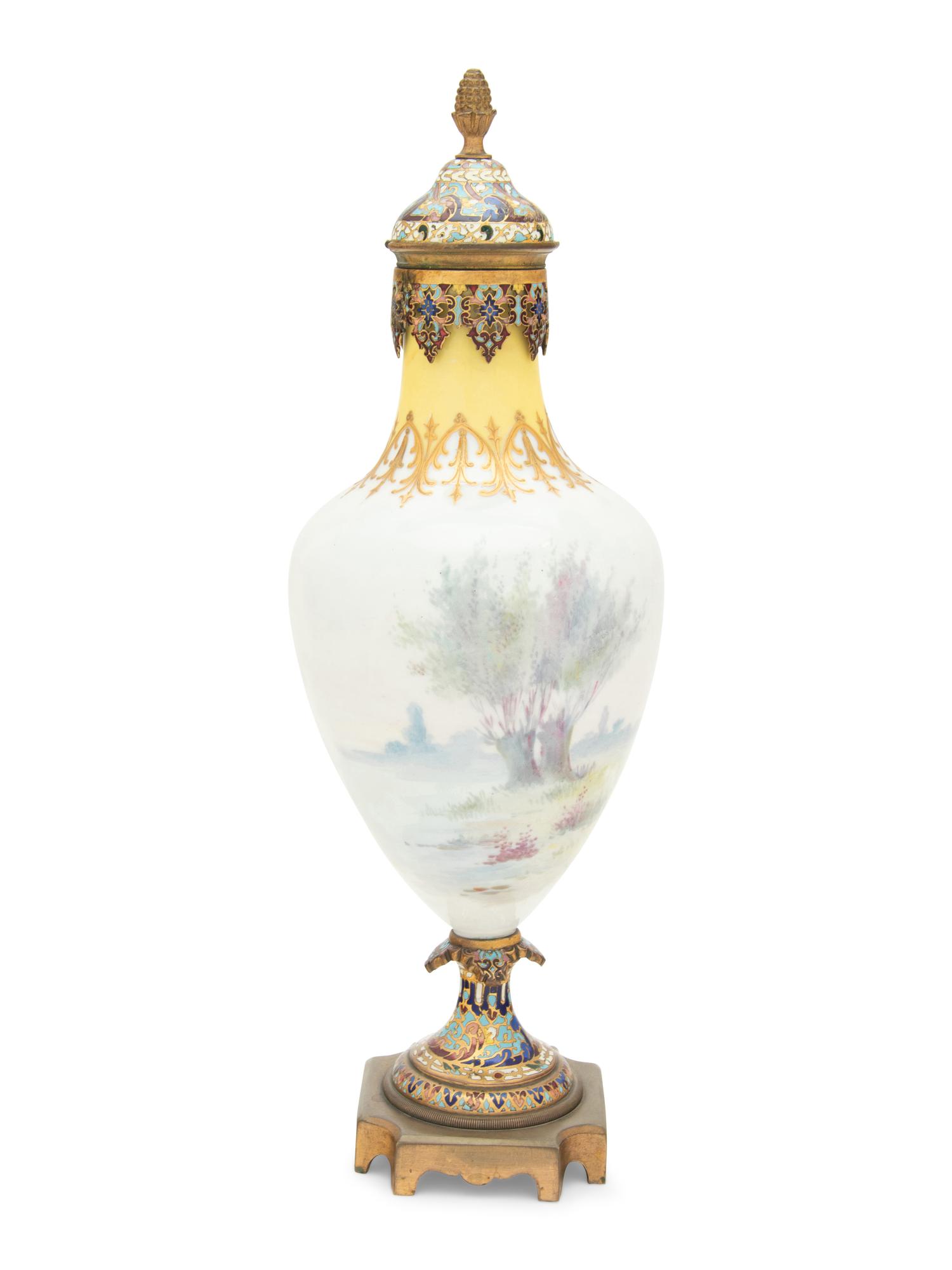 A Sèvres Style Gilt Bronze and Champlevé Enamel Mounted Porcelain Vase and Cover