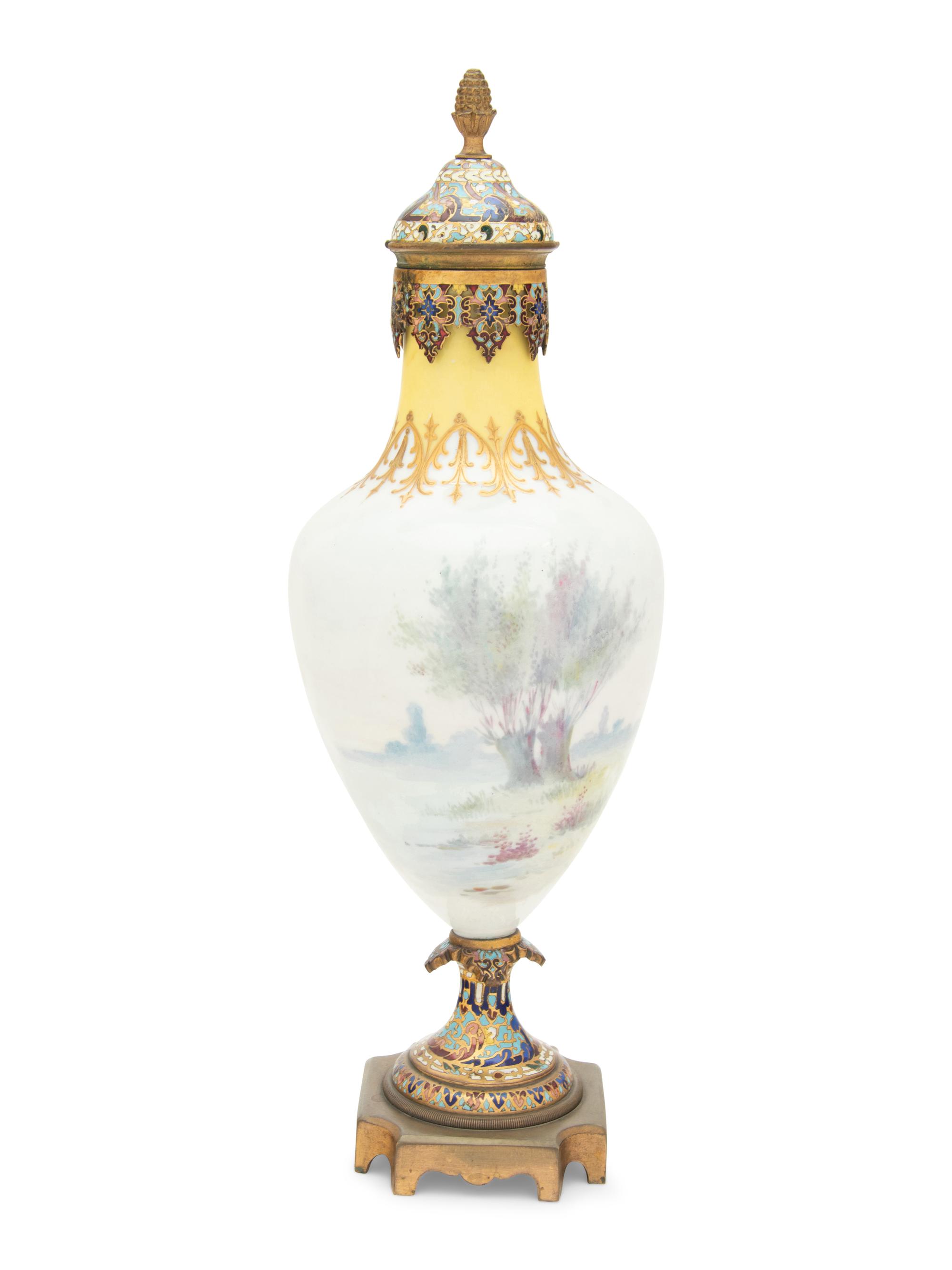 A Sèvres Style Gilt Bronze and Champlevé Enamel Mounted Porcelain Vase and Cover