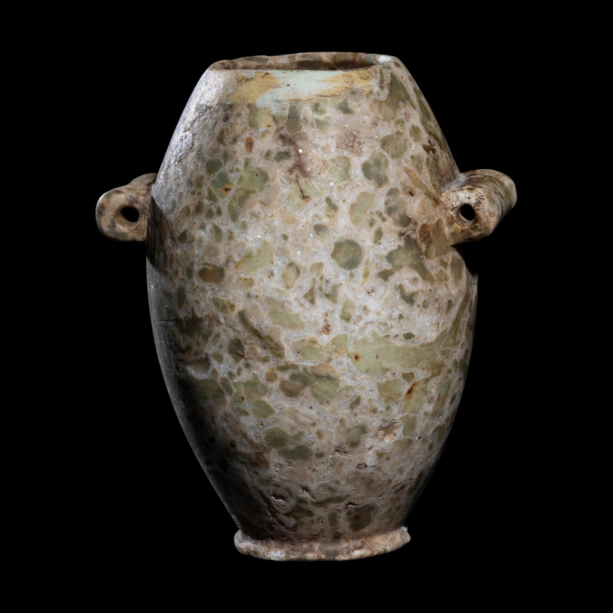 An Egyptian Green Gray Breccia Vessel with Lug Handles