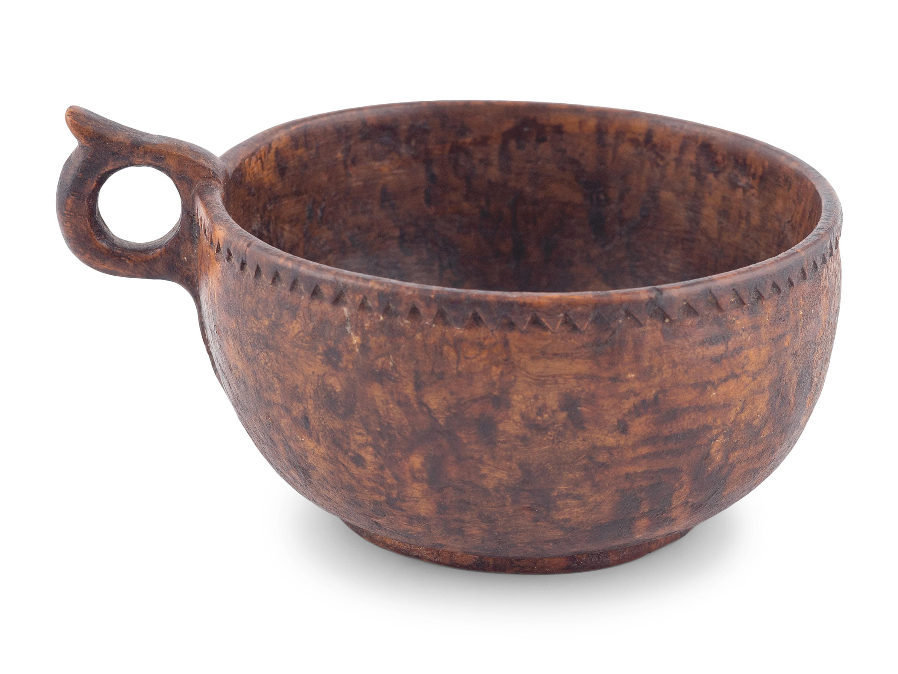 A Finely Turned and Carved Burlwood Cup with Handle
