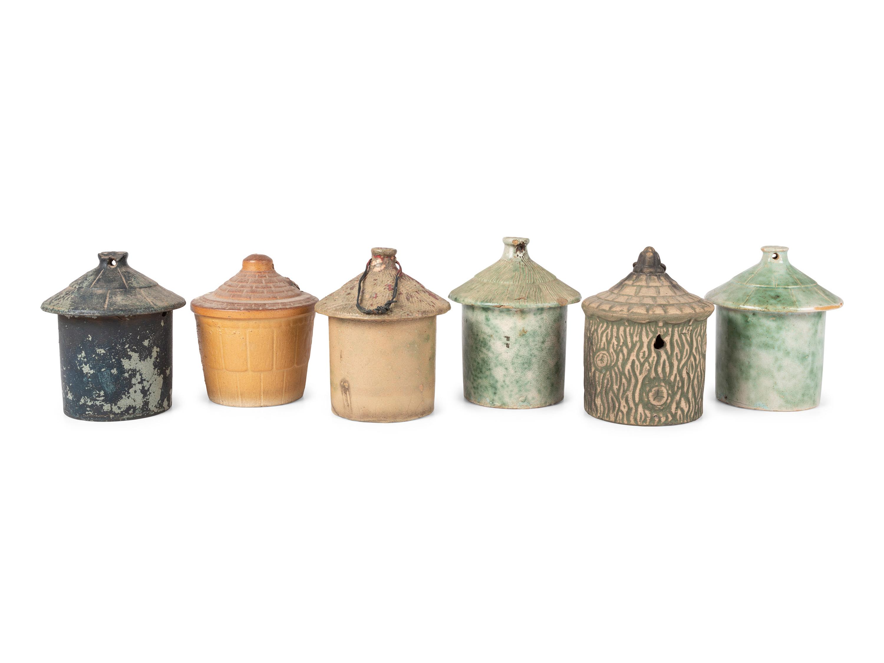 Six Stoneware Birdhouses, Including Dalton Pottery