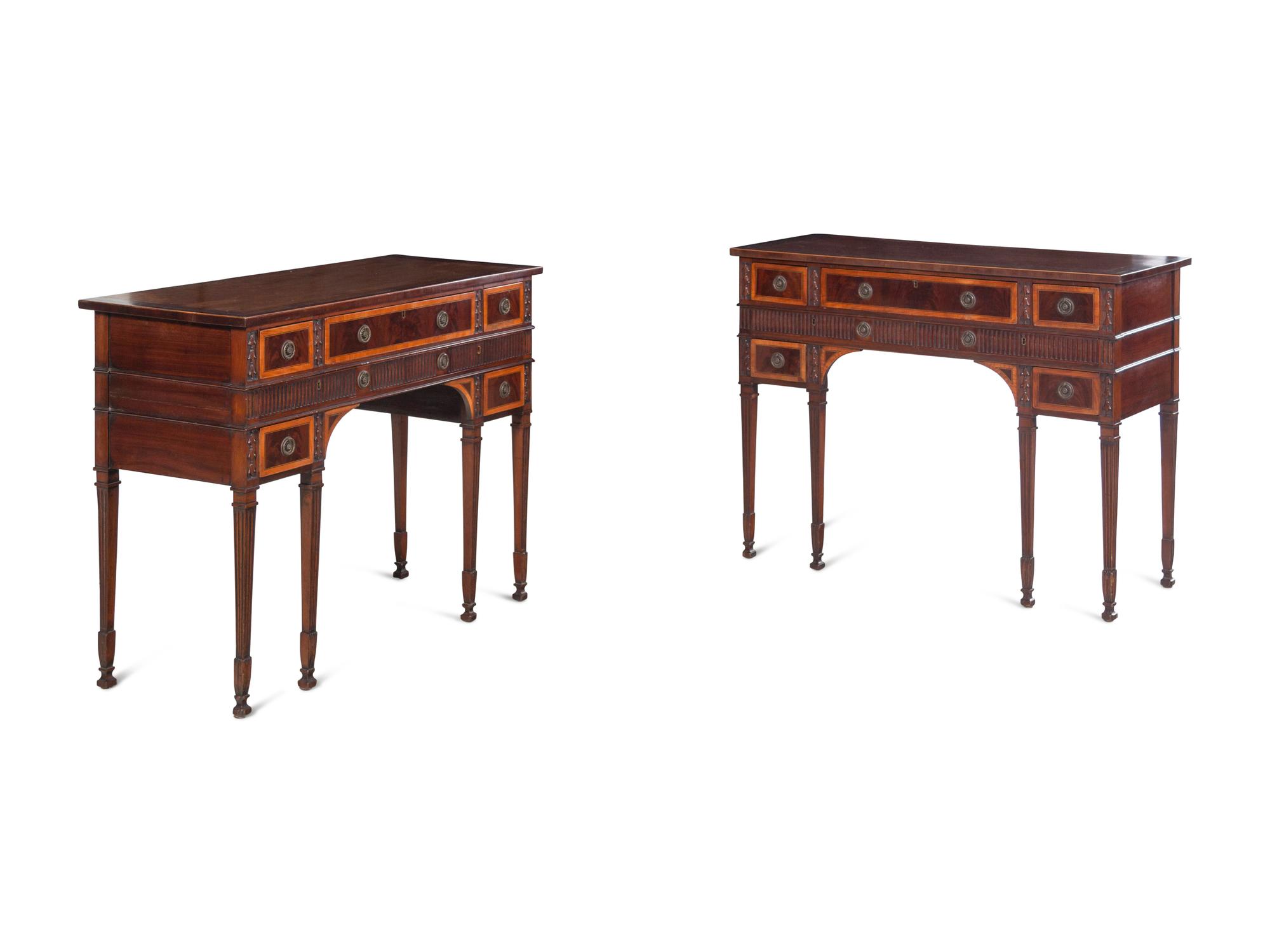 A Pair of George III Style Carved Mahogany and Satinwood Dressing Tables