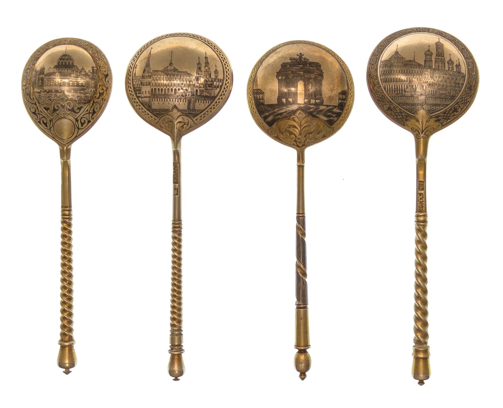 A Group of Four Russian Niello Silver Spoons, Various makers, Moscow, 19th century, each having a twist stem, the undersides with scene