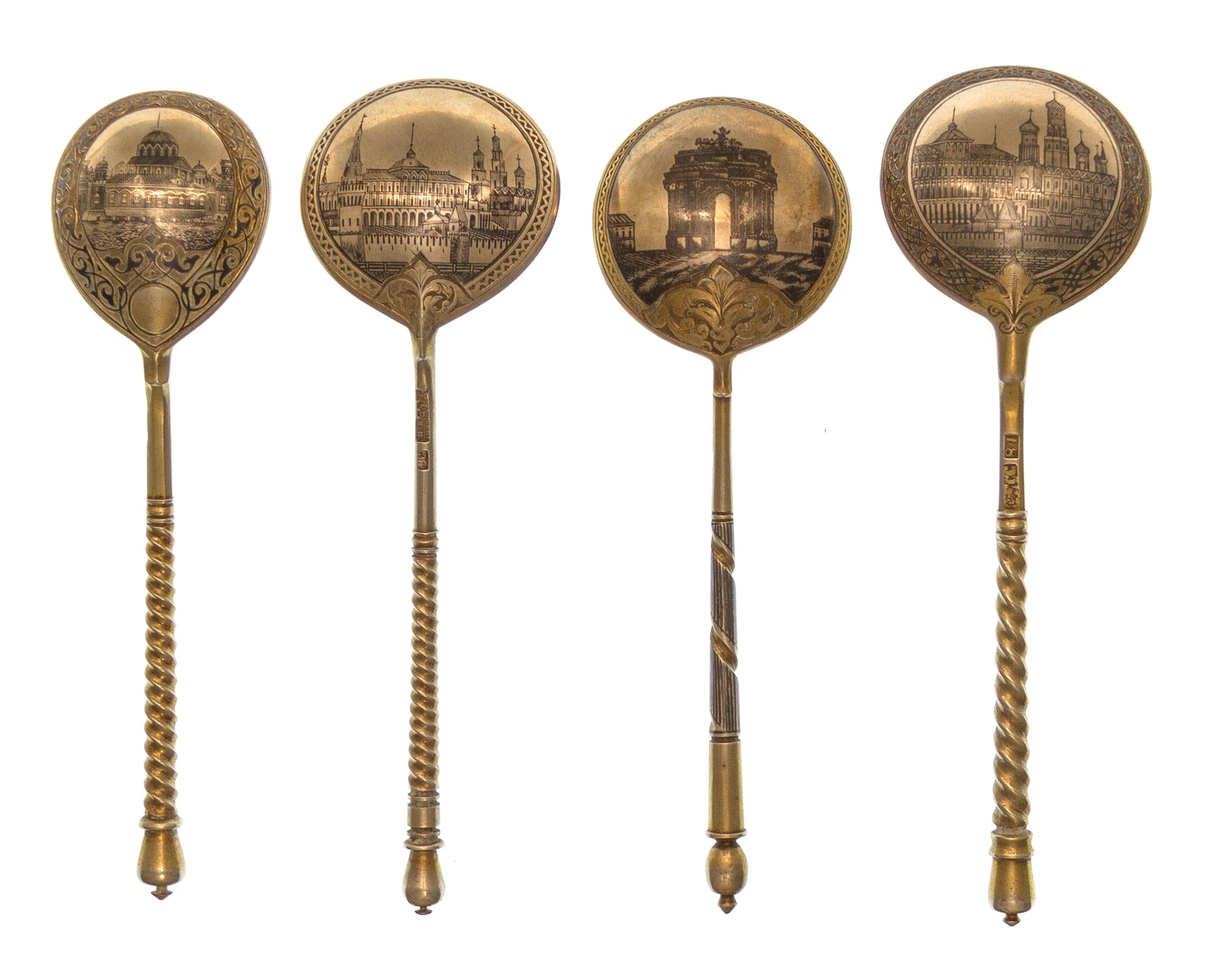 A Group of Four Russian Niello Silver Spoons, Various makers, Moscow, 19th century, each having a twist stem, the undersides with scene