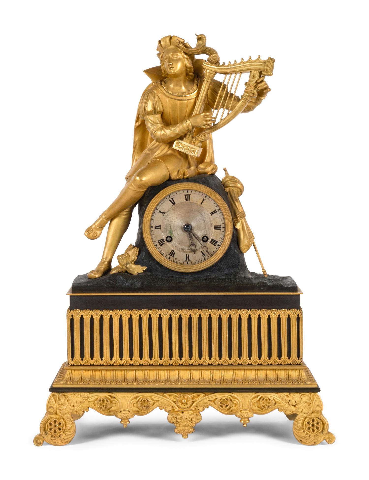 A Charles X Patinated and Gilt Bronze Figural Mantel Clock