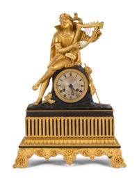 A Charles X Patinated and Gilt Bronze Figural Mantel Clock