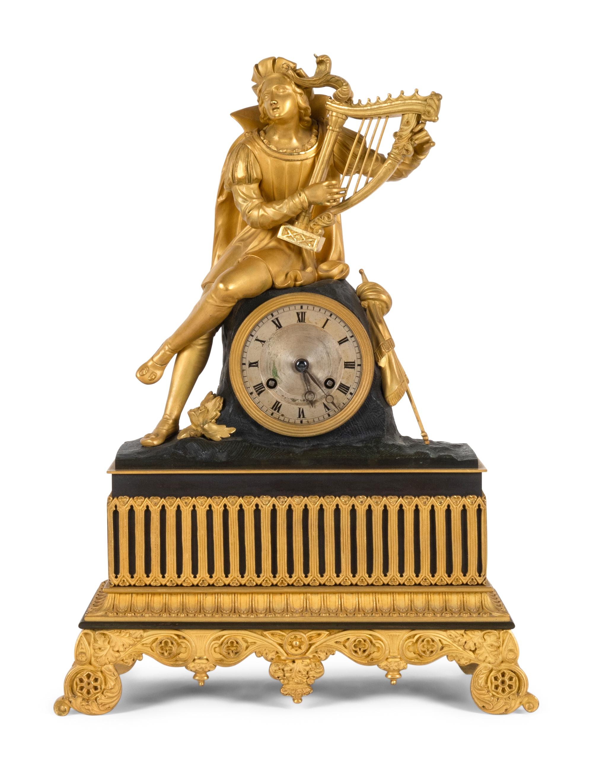 A Charles X Patinated and Gilt Bronze Figural Mantel Clock