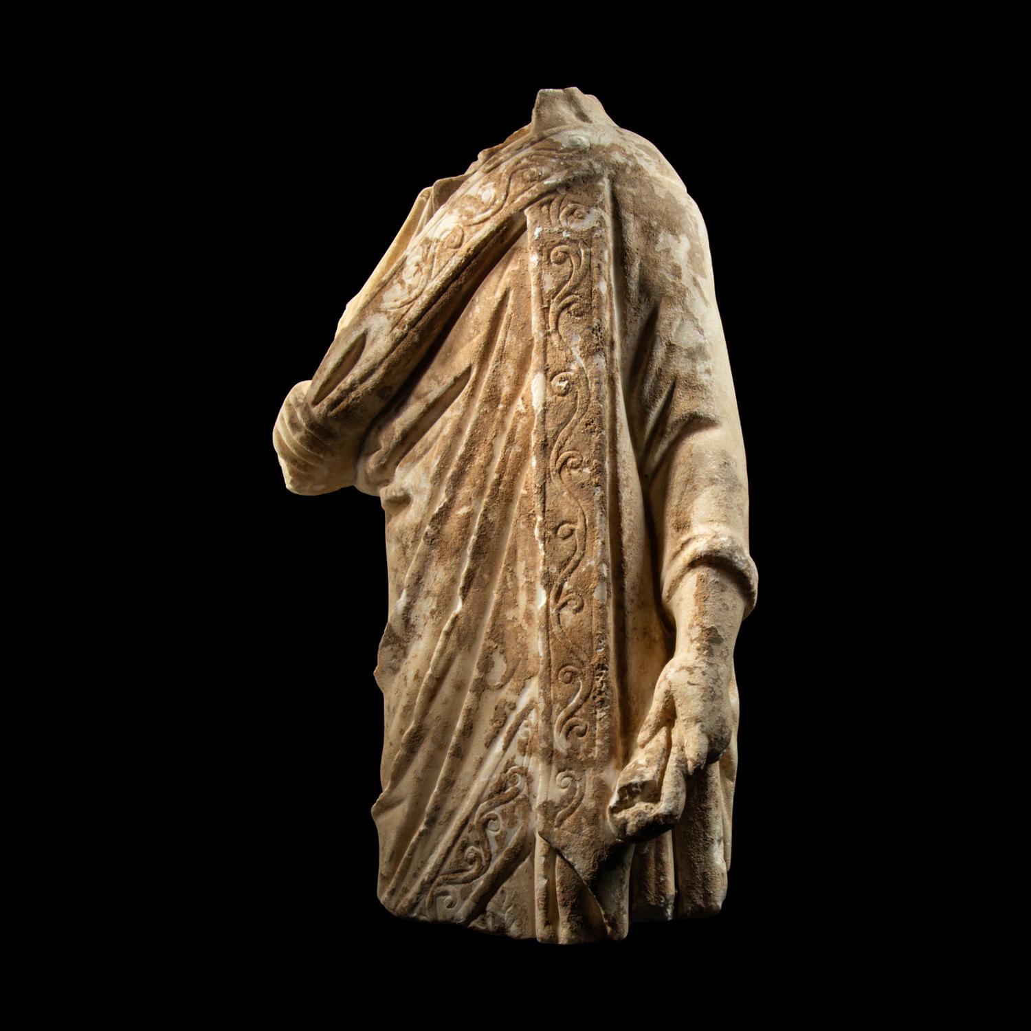 A Late Roman or Byzantine Marble Togatus Holding a Mappa