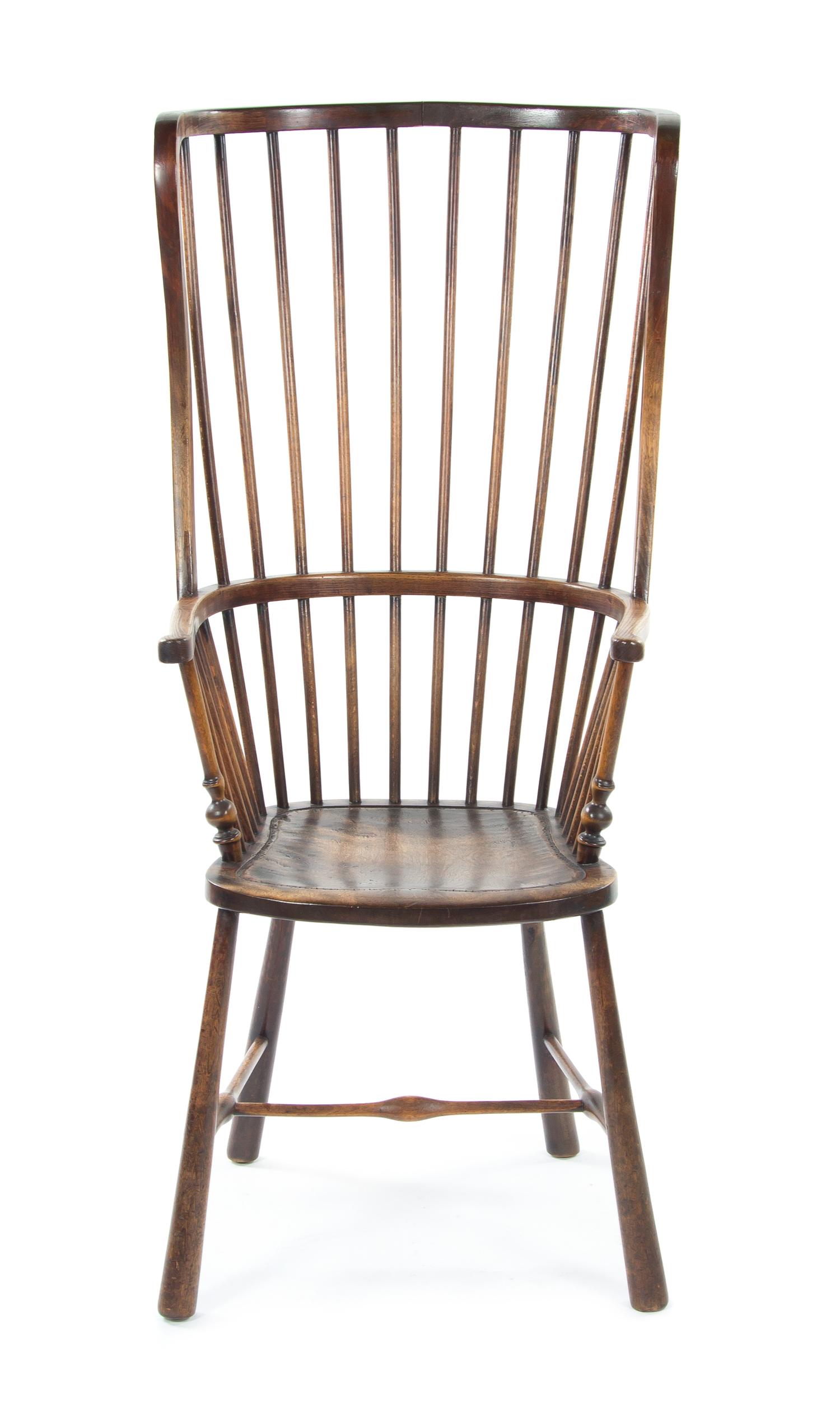 An English Oak Windsor Chair, Height 47 1/2 inches.
