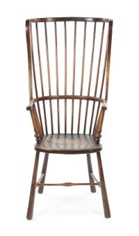An English Oak Windsor Chair, Height 47 1/2 inches.