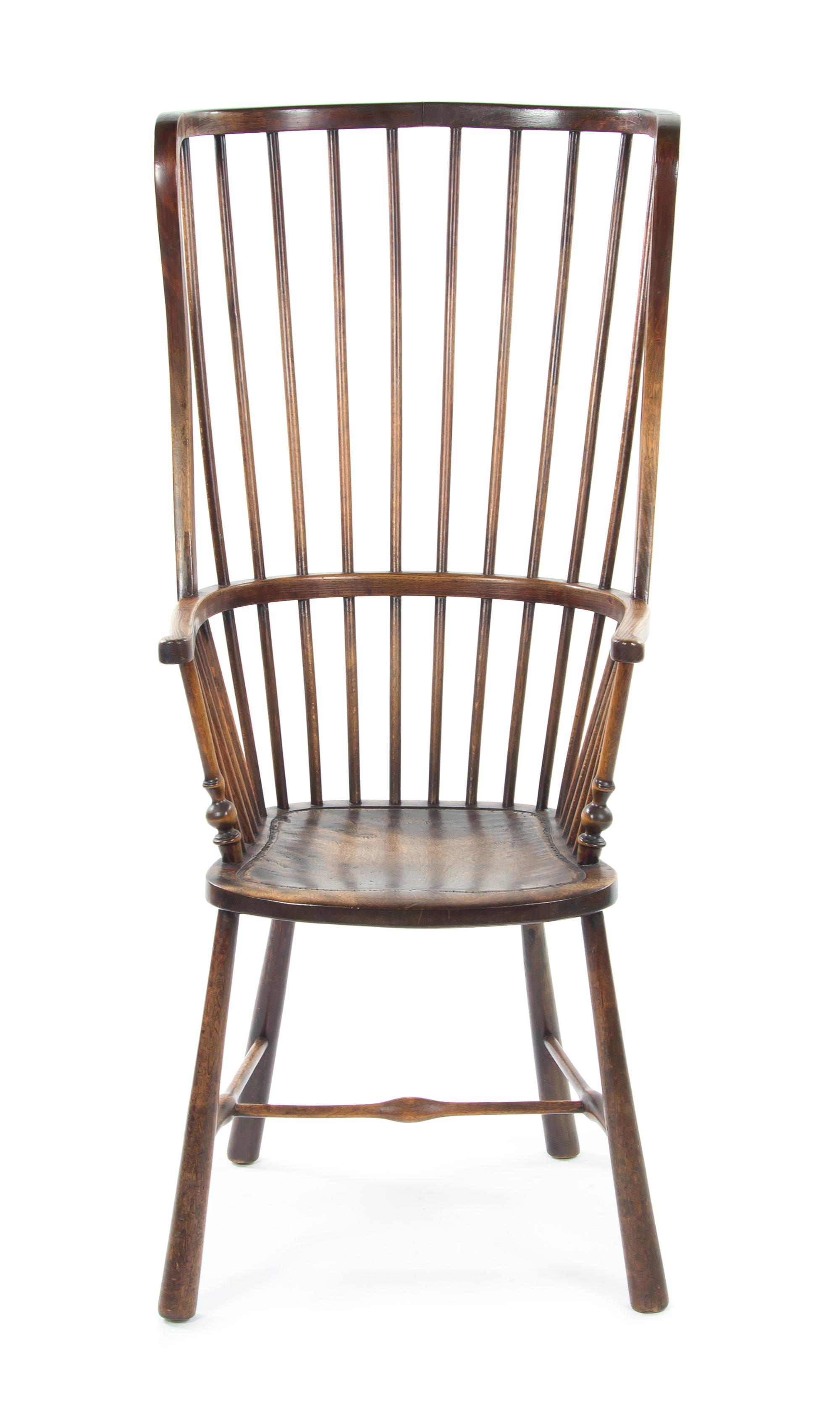 An English Oak Windsor Chair, Height 47 1/2 inches.