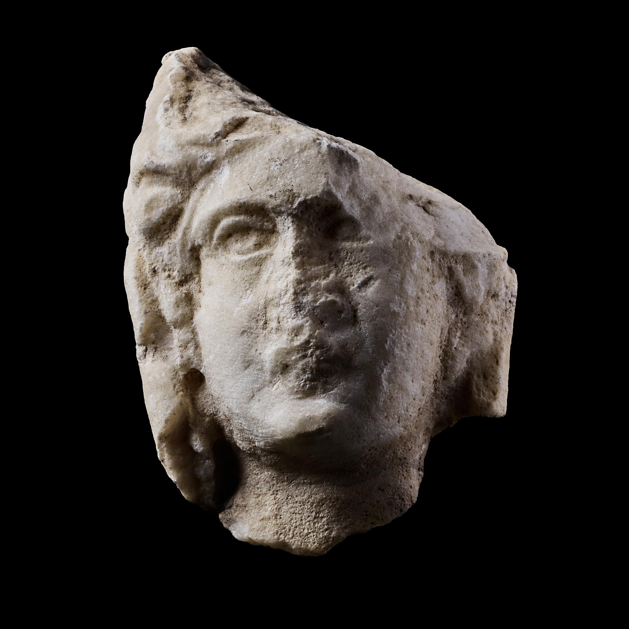 A Roman Marble Head of a Veiled Woman