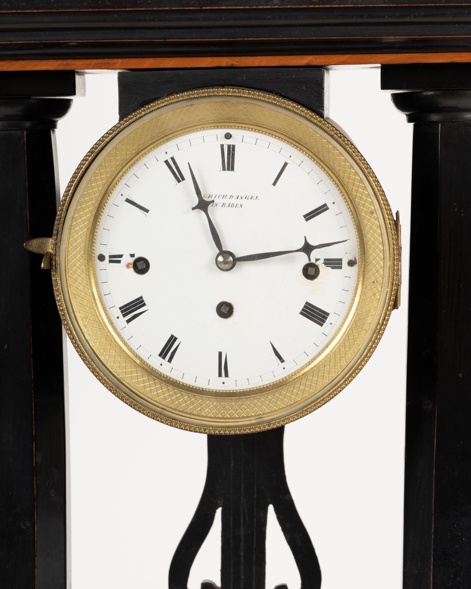 A German Ebonized Cherrywood and Gilt Bronze Mounted Architectural Mantel Clock