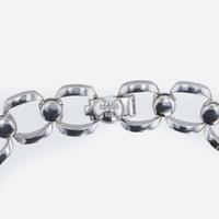 An 18K, white gold and diamond necklace Carelle