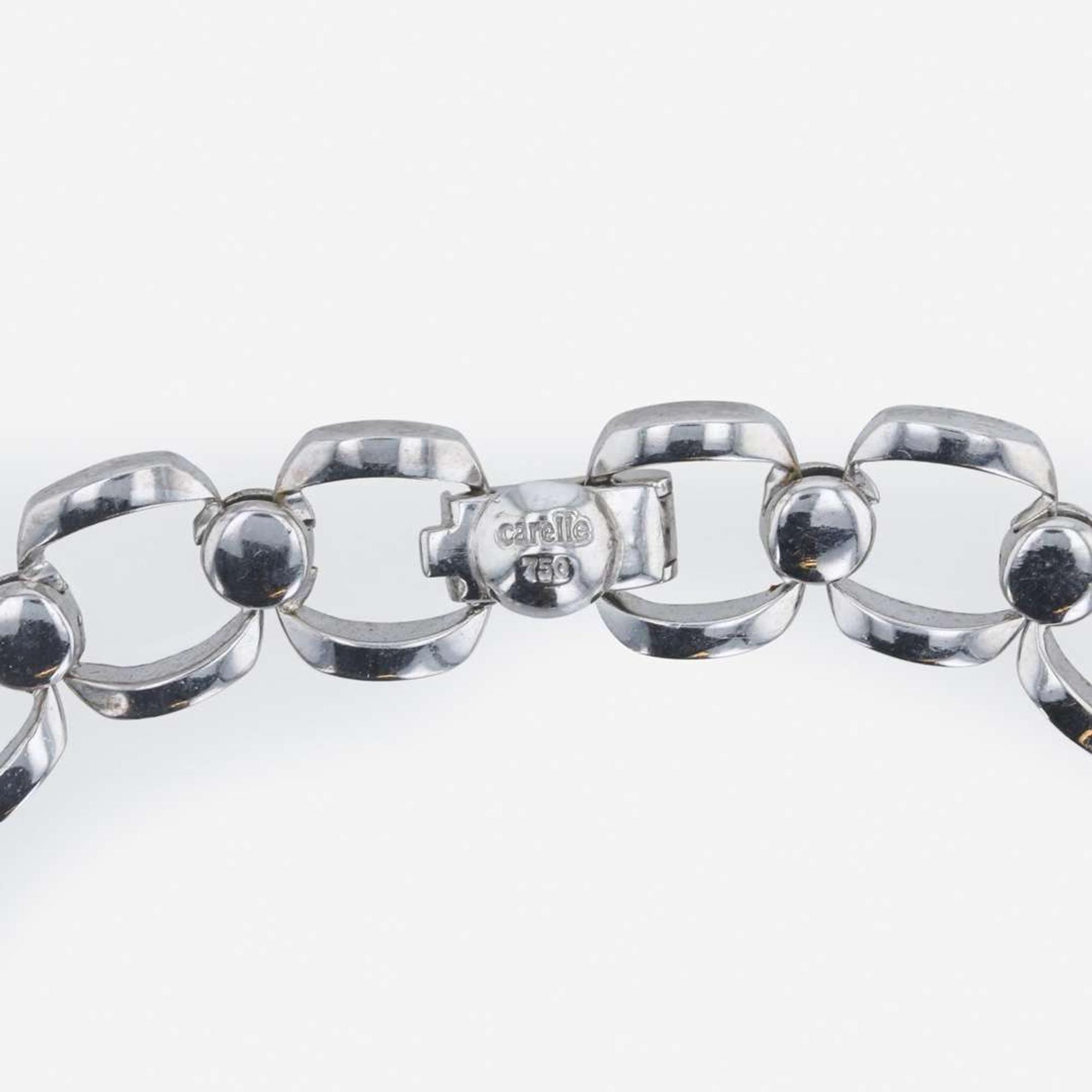 An 18K, white gold and diamond necklace Carelle