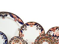 An Assembled Royal Crown Derby Porcelain Dinner Service
