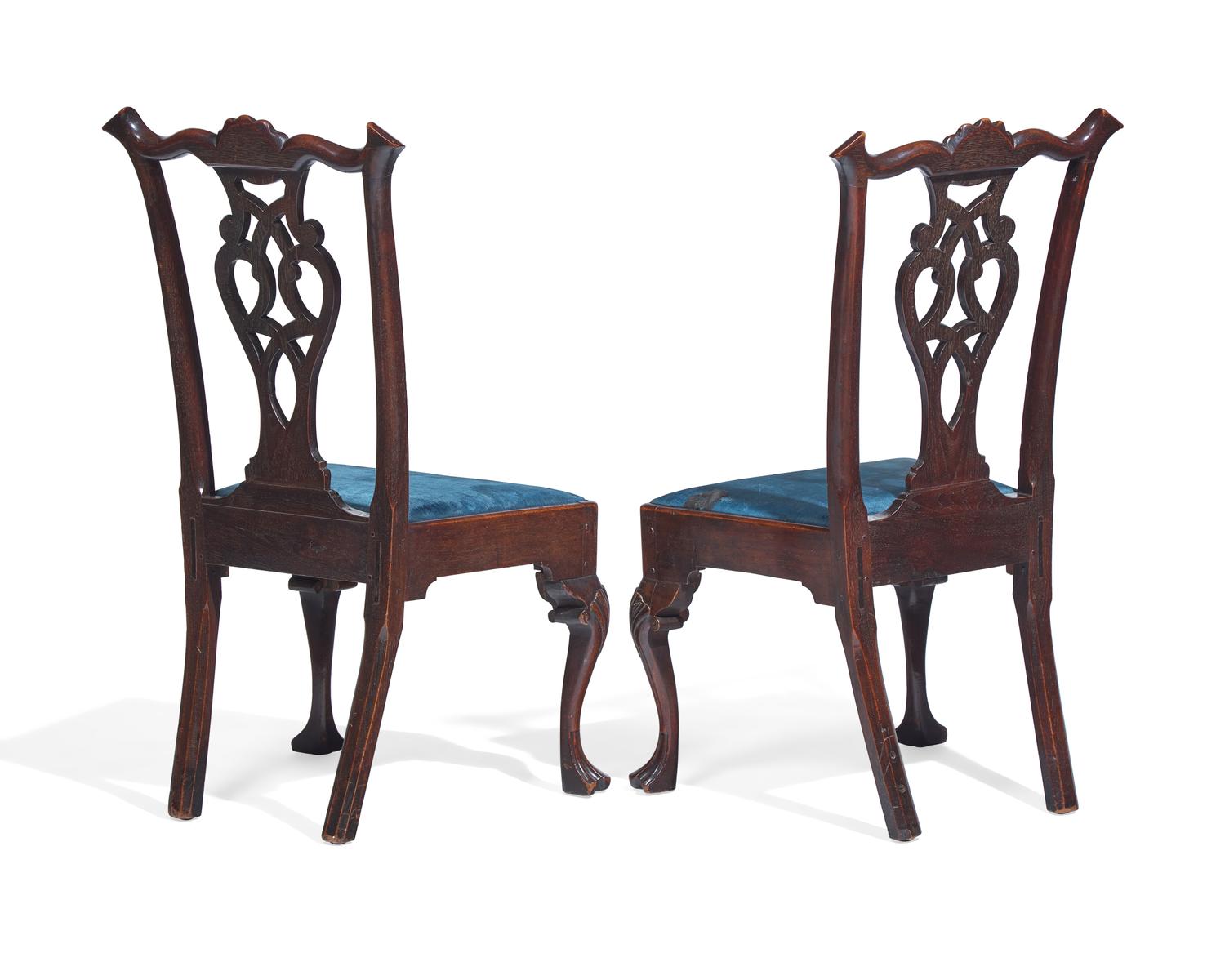 A Pair of Chippendale Carved Walnut Side Chairs